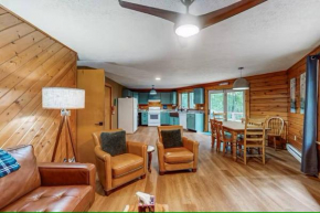 Hexagonal log cabin in woods